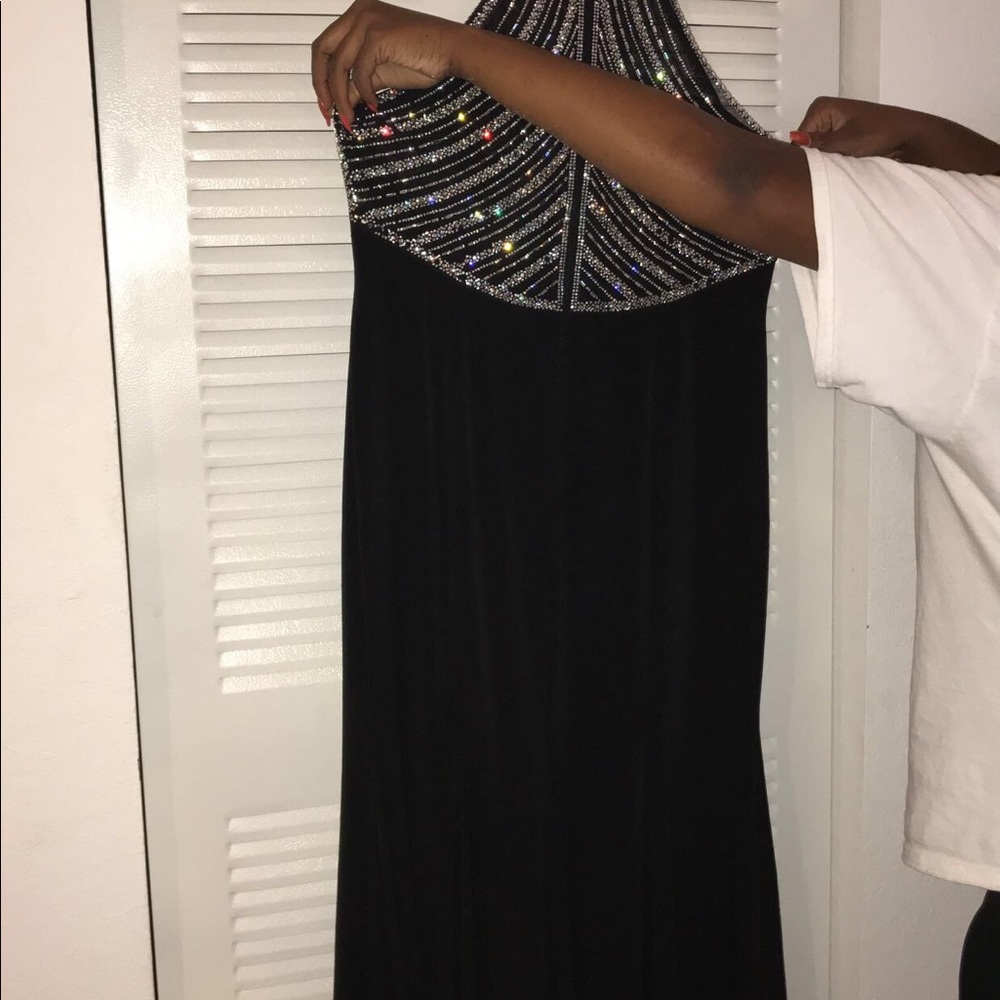 This is a black dress from Macy’s.Weared one time